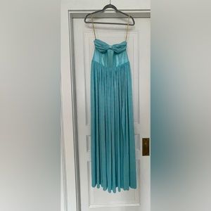 Bronx and banco never worn size medium blue dress. Perfect for prom